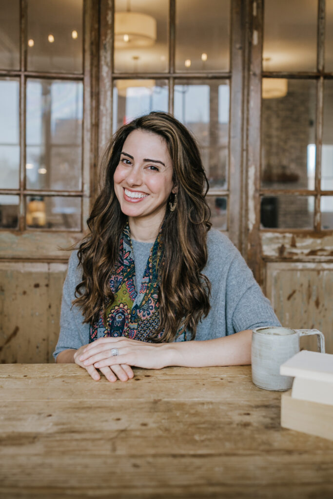 Jennifer Kruse, owner of the The well house, sitting at a wooden table smiling. Jennifer Kruse takes a holistic approach to counseling. Jennifer is a business owner and mother, so she can relate to the overwhelmed mom in southlake, tx feeling. Maybe you feel that you’re drowning tasks that seem to never end . Here at the well house, we understand. Counseling at the Well House may be a great fit!