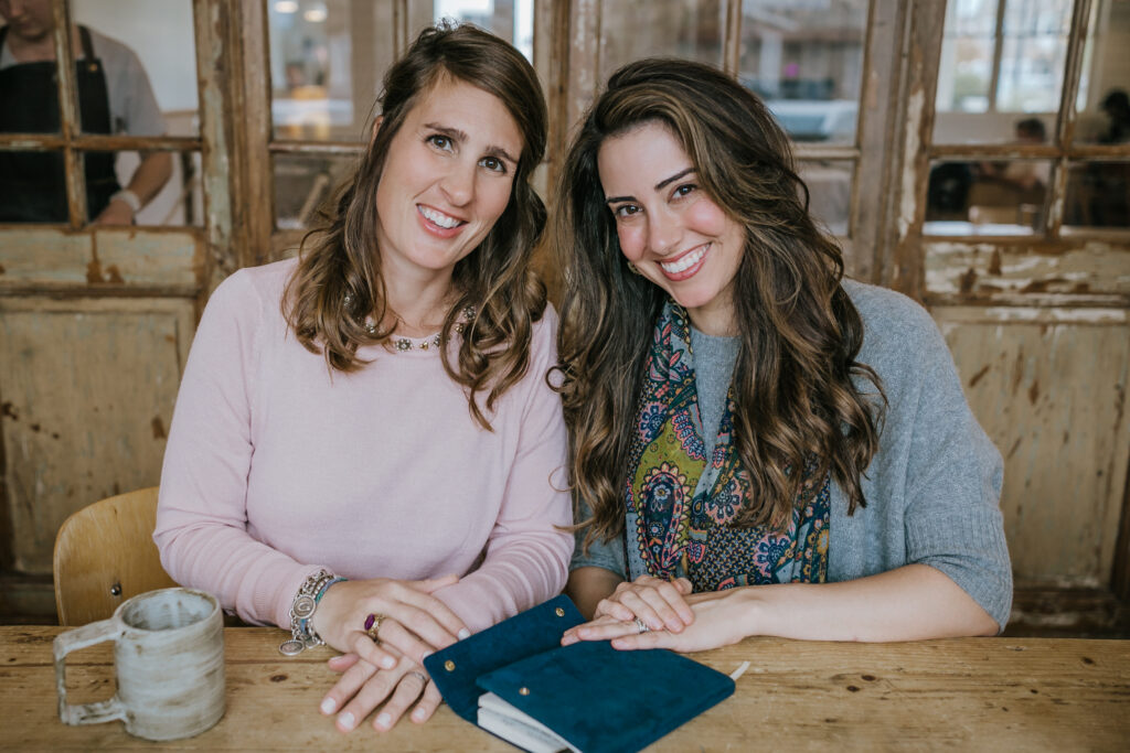 Jennifer Kruse and Reagan V from The Well House sitting together at a wooden table smiling. If you’re concerned about how to be a better parent, then while your teen is attending counseling for teens in southlake, texas, it may be time for you to begin parent coaching in texas. With the help of therapists in Southlake, you can begin to feel more confident.