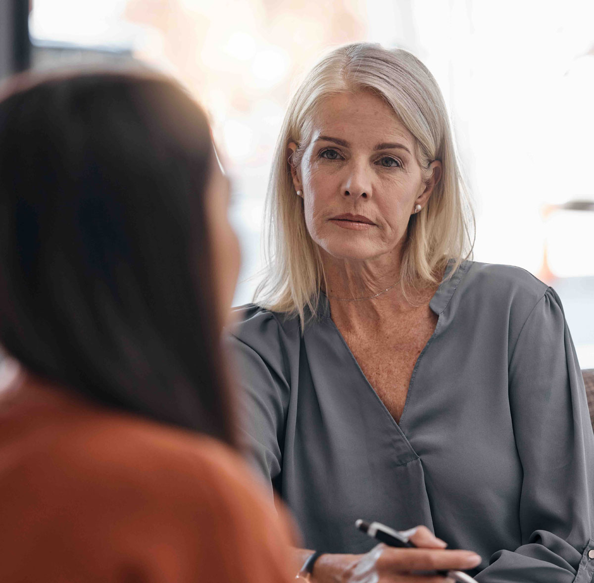Jennifer Kruse, a therapist at The Well House smiling and sitting at a rustic table. If you‘re dealing with trauma and having a hard time overcoming it, try emdr therapy in south lake, tx with a caring therapist such as Jennifer Kruse. The Well House is a great place for those looking to use mixed modalities and a holistic approach. EMDR therapy in Texas can also be offered. We are currently online and would be happy to serve you from anywhere in the state. Let’s begin counseling in southlake Texas today.