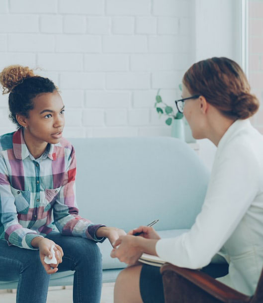 Jennifer Kruse, a therapist at The Well House smiling and sitting at a rustic table. If you‘re dealing with trauma and having a hard time overcoming it, try emdr therapy in south lake, tx with a caring therapist such as Jennifer Kruse. The Well House is a great place for those looking to use mixed modalities and a holistic approach. EMDR therapy in Texas can also be offered. We are currently online and would be happy to serve you from anywhere in the state. Let’s begin counseling in southlake Texas today.